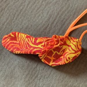 Men’s size small 28-30” g-string swimsuit.